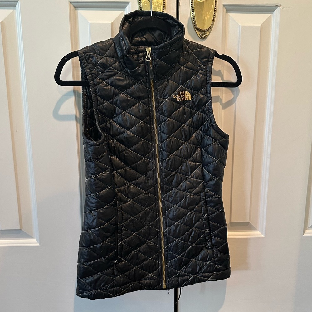 Black and Gold North Face Women’s Vest